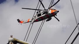 Norwegian rescue service evacuating ill lady from sailing ship in the North sea || DSLR footage