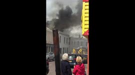 Smoke rises from restaurant on fire in Cheltenham, UK
