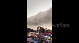 Rare roll cloud phenomenon captivates residents in northern China