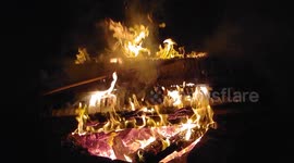 Old piano keyboard set on fire. Great balls of fire.