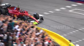 Formula 1 race cars paraded through the passeig de gracia street in the cente of barcelona