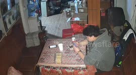 Frustrated gamer destroys his own phone in southern China