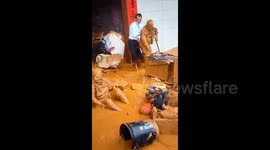 Chinese seniors rescued covered in mud after landslide hits southern China