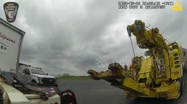 USA: Kitten Safely Retrieved from Truck's Wheel Well