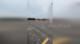 US: Mattydale Kids Beat the Heat with Fire Department Hoses Outside Local School