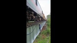Under Engine, Dangling Off Bridge, Loco Pilots Go Extra Mile To Repair Train and rescue thousand of passengers