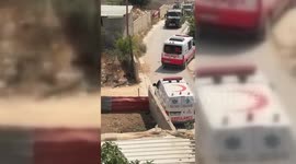 The Israeli army tied injured young man on the hood of a military jeep