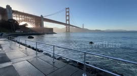 Waves and tourists on Golden Gate Bridge