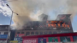 Massive fire erupts at commercial building in northern India