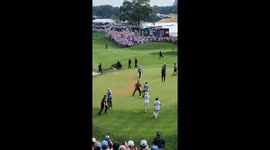 Climate activists disrupt Travelers Championship storming the 18th green