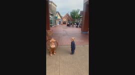 Boy Can't Stop Staring at Copper Man