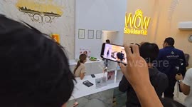 Police raid illegal beauty clinic before crying doctor climbs onto roof to try and escape