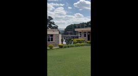 Kenyan protesters breached parliament barricades , footage shows protesters entering in parliament