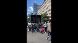 Protesters footage from Nairobi in Kenya shows , protesters agitating infront of security personnel near parliament area