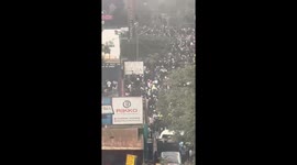 Protest against finance bill in Kenya - visuals filmed by a local resident in Nairobi shows - people in large numbers on roads to protest against the bill .