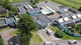 Woman arrested after crashing vehicle into special school