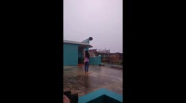 Schoolgirl dodges lightning strikes while dancing on roof