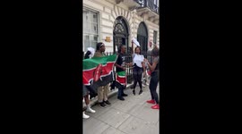 Kenyans in London protest outside the Kenya High Commission in protest against the Kenyan Goverment .
