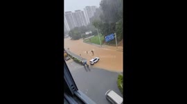 Restaurant employees rescue senior resident caught in floodwaters