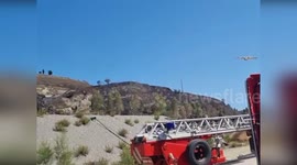 Italy: Canadair Deploys Water to Combat Landfill Fire in Mazzarra Sant'Andrea