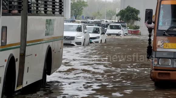 Heavy Rain In Delhi-NCR, Roads Flooded, Car Submerged, Traffic Crawls,One dead after roof collapses at Delhi airport - Buy, Sell or Upload Video Content with Newsflare
