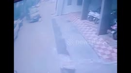 Two children went unscathed even after coming under car , both can been seen walking away