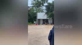 Residents form human chain to save elderly neighbour stranded in floods