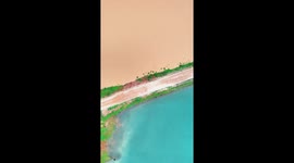 Wetland in China's Yunnan becomes dual-toned after heavy rains