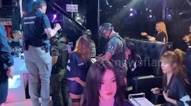Police carry out show raids on Thai red light strip