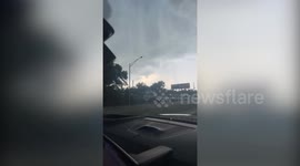 Mini tornado sends truck flying into oncoming traffic