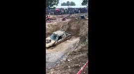 Off-road race goes wrong when car rolls into ditch