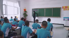 A one-armed Chinese young man's inspiring story as teacher aiding Xinjiang