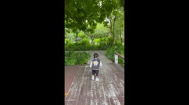 Toddler jumps in the bushes... for no reason at all