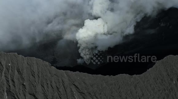 Mount Dukono Erupts minutes after reaching summit, capturing incredible drone shots in Tobelo, Indonesia