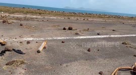 Large rocks brought up by the sea after the passage of hurricane Beryl in St Vincent strewn across the old airport strip in Kingstown, St Vincent