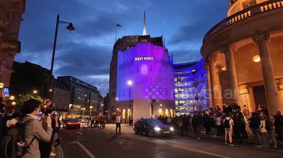 The countdown to the end of the UK General Election and the first polls are displayed resulting in cheers due to the defeat of the Tories