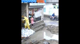 Narrow Escape For Girl Drowning In Municipal Pit , rescued by a young boy from the dangerous situation