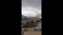 Sandstorm obscures visibility at Mingsha Mountain and Crescent Spring in China