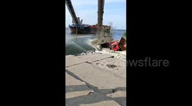 Eight trucks used to seal dam breach in southern China