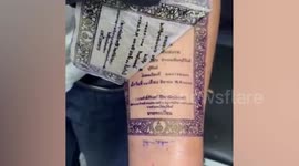 Devoted husband has marriage certificate tattooed onto his arm