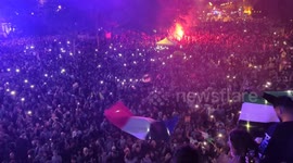 Video shows celebrations in Paris as leftists beat far right in France's snap elections