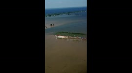 All-out efforts made to repair breached dike in China's Hunan