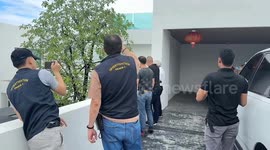 Police raid wealthy Chinese expat's house where two pet LIONS were being kept