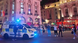 Police encounter England football fans who are celebrating the big football win against the Netherlands