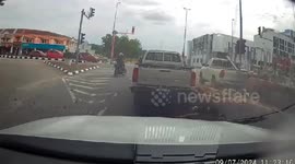 Heavy logs roll off lorry and knocks over woman in Malaysia