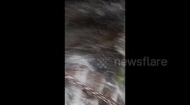 China: Conquering Nature: Climbing in the Rain