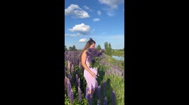 Ryazan woman filmed with lupines in pants