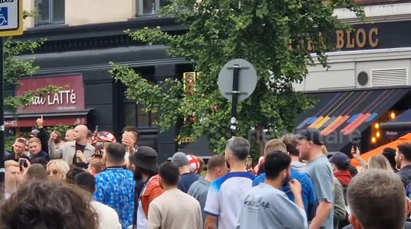 England fans hoist Street sign onto podium in pre game celebrations. Ahead of the Euros 2024 final, against Spain
