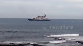 That's an adorable view of an ocean with a cruise ship in it, video taken in East London, Eastern Cape South Africa.
