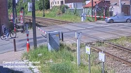 Belgium: Cyclist Narrowly Escapes Train Collision in Wavre